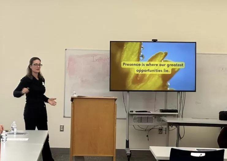 Cindy speaking in a classroom workshop