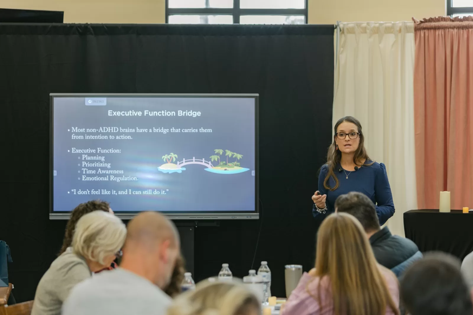 Cindy North teaching executive function concepts during a coaching presentation